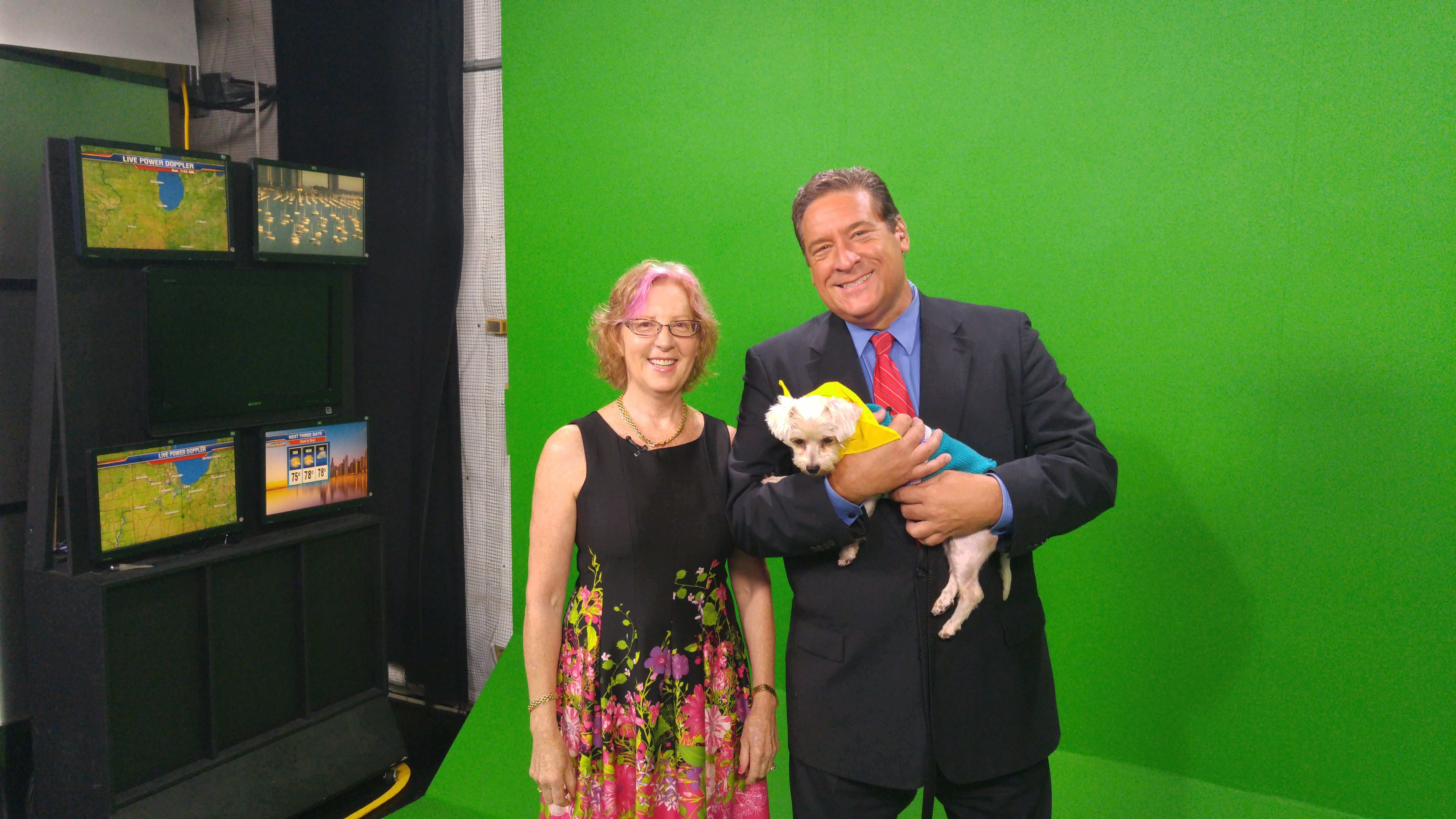 Tracie Hotchner, Chicago weatherman Mark Strehl with Gia the dog
